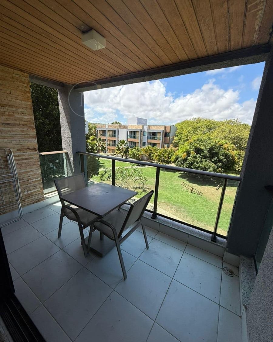 Varanda do apartamento no ILOA com vista para o jardim do resort